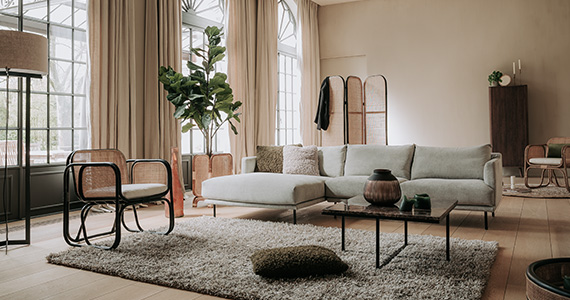 Rustic vibes: een bohemian interieur met rotan meubels 