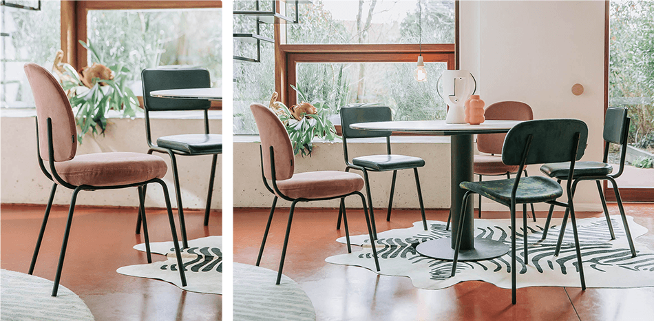 Moderne eethoek met veel gekleurde stoelen