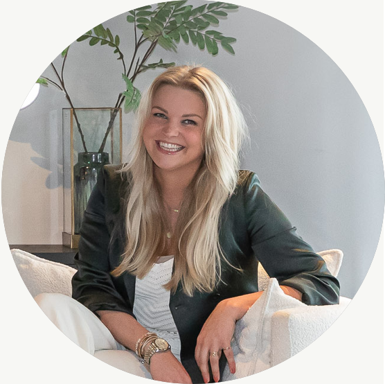 saleswoman sitting and smiling