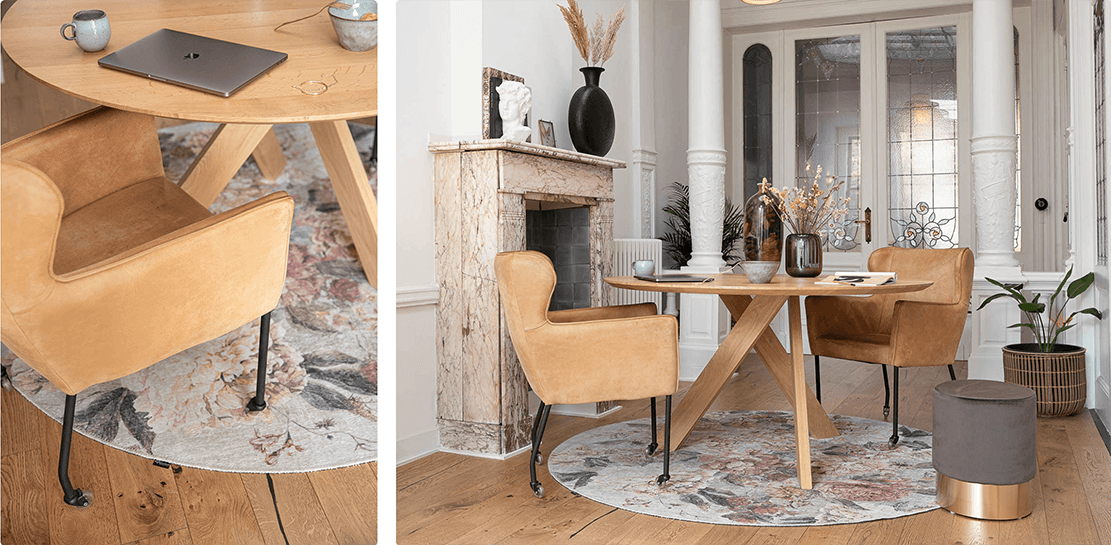 Luxe eetkamerstoel aan ronde tafel